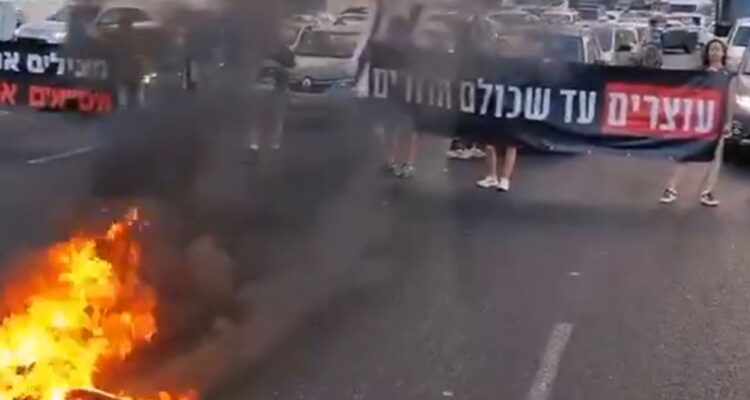 Anti-war protesters block major highways — again