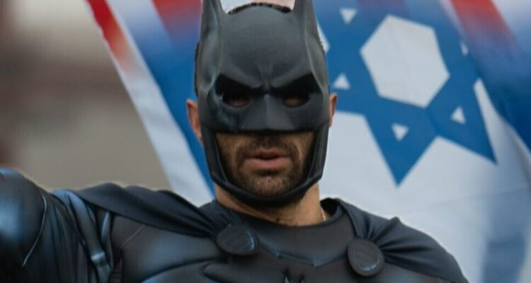 IDF soldier heads to NYC dressed as Batman to honor Bibas kids, help hostages