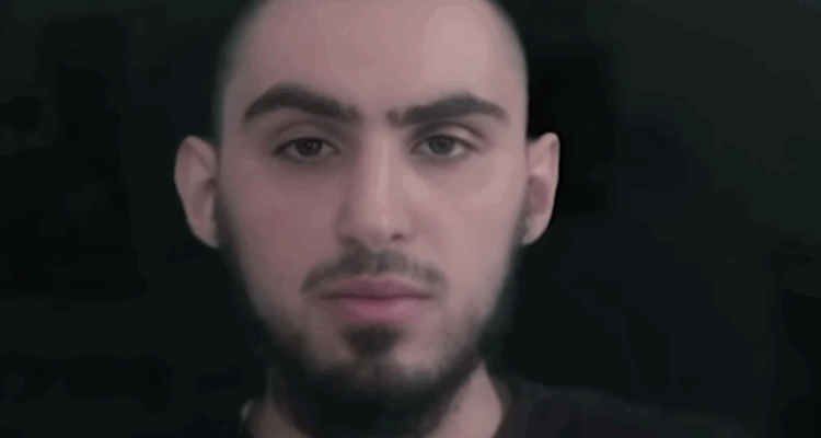 Terrorists pressured hostage Rom Braslavski to convert to Islam; he refused, donned tefillin after release