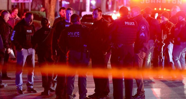 Suspect at large in Brown University shooting that killed at least two, injured eight