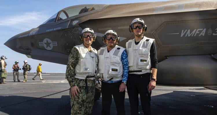 Trump envoys visit US aircraft carrier as Tehran warns against pressure