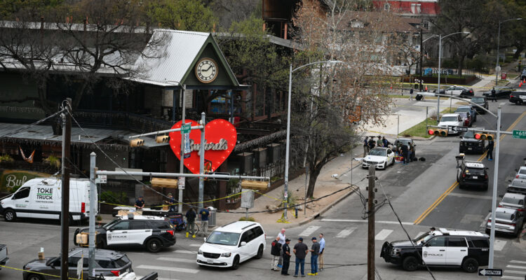 Gunman wearing Iranian flag emblem kills 2 in mass shooting at Texas bar