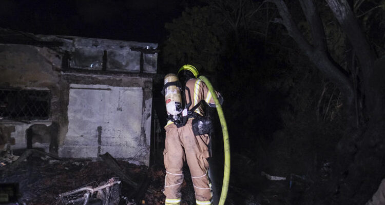 Missile barrages from Iran and Hezbollah injure at least eight across Israel; direct hit reported in Nahariya