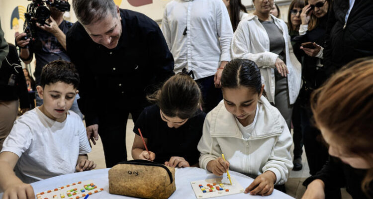 Israeli schools partially reopen after two-week war closure