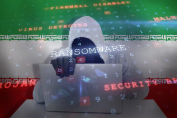 Hacker against digitally generated Iran's national flag (Illustration- Shutterstock)