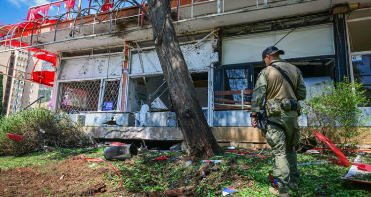Hezbollah launches mass rocket barrages at northern Israel