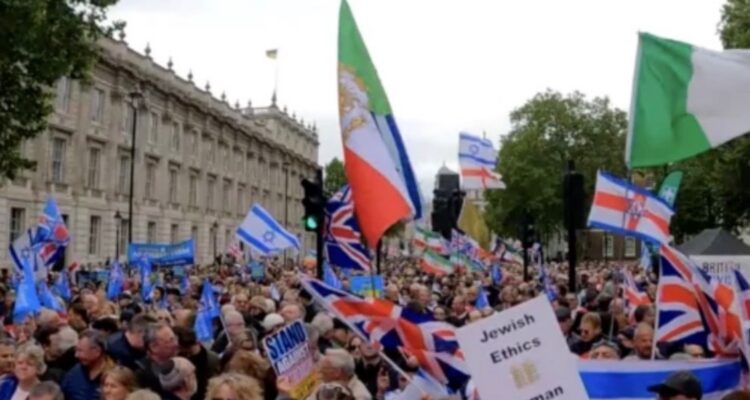 Labour politician booed as thousands rally against antisemitism in London