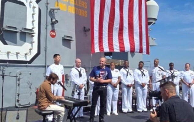 Alon Ohel plays ‘Superman’ on USS Nimitz in NYC