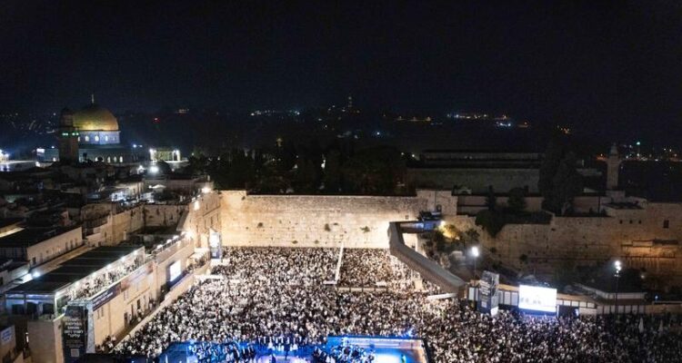 Freed hostages join tens of thousands in prayers at the Western Wall