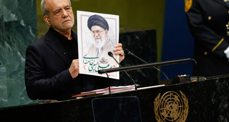 Iran’s president shows Khamenei photo at UN