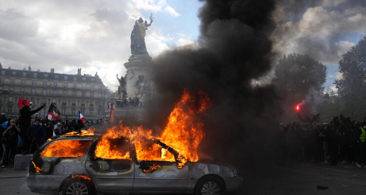 France erupts: rioters torch city hall, attack police as half a million protest